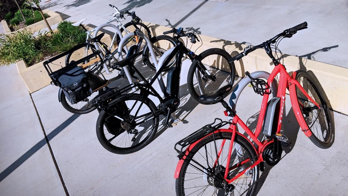 06 Article Erik Electric Bikes At Rack