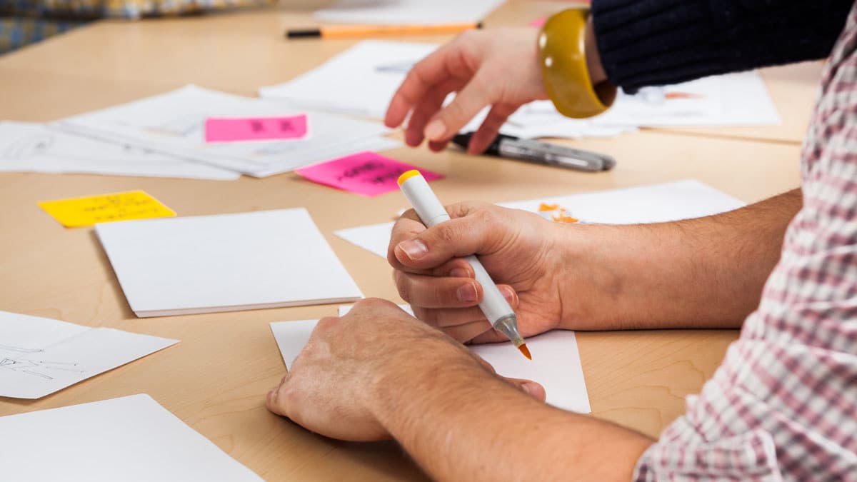 Full-service graphic design team - drawing table