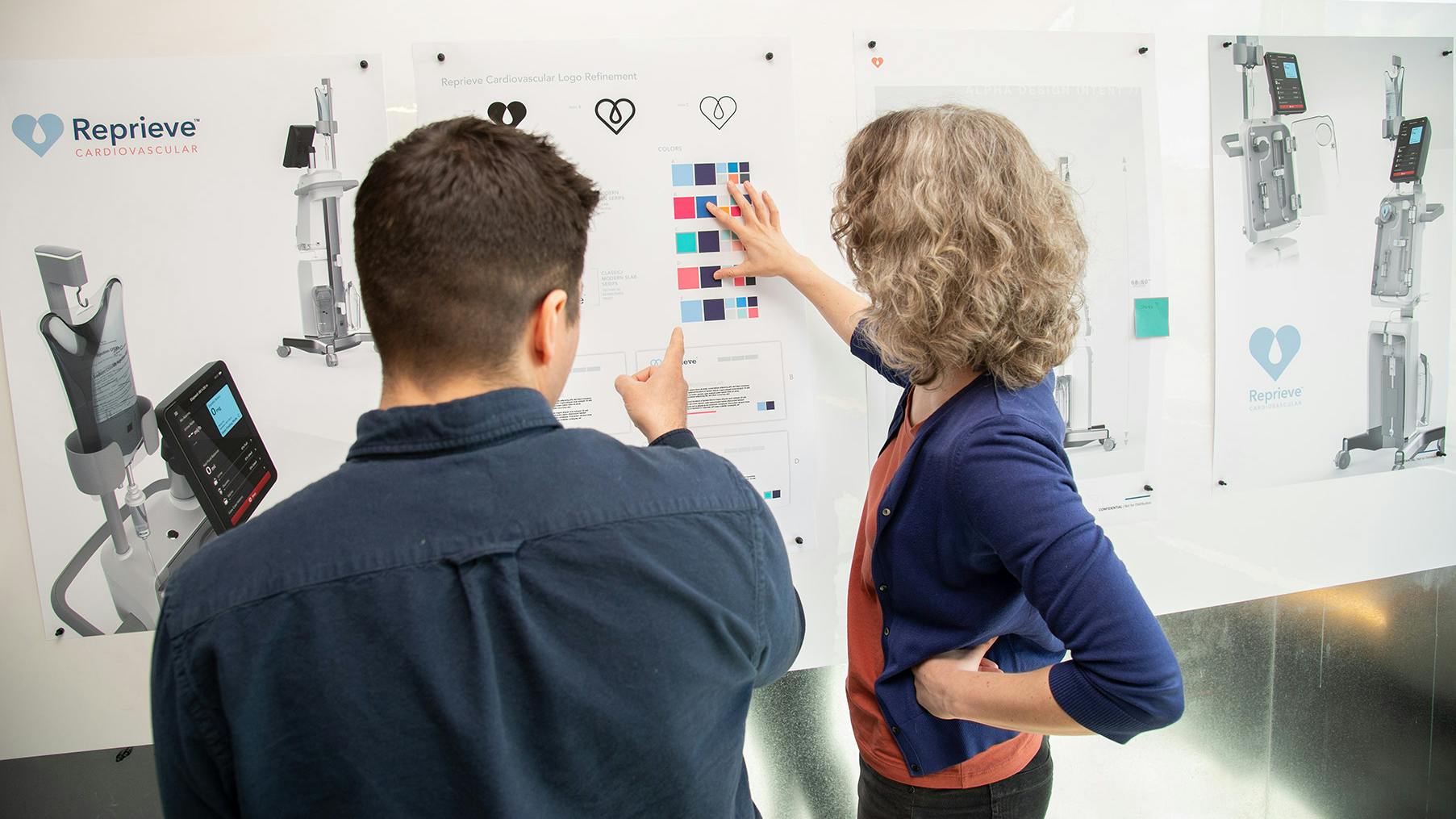 Visual designers looking at branding